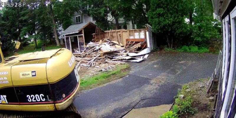 The old garage comes down to make room for our new addition!
