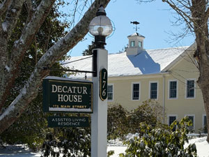 Decatur House sign with snow