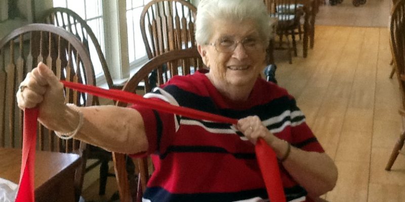 resident with exercise band