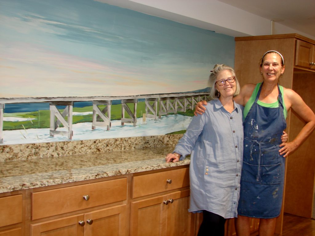linda and mary with mural