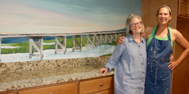 linda and mary with mural